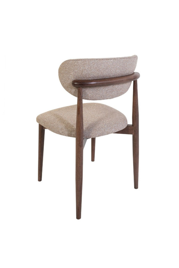 Vue plongeante de la chaise SPECIAL mettant en valeur son dossier ergonomique et sa texture.